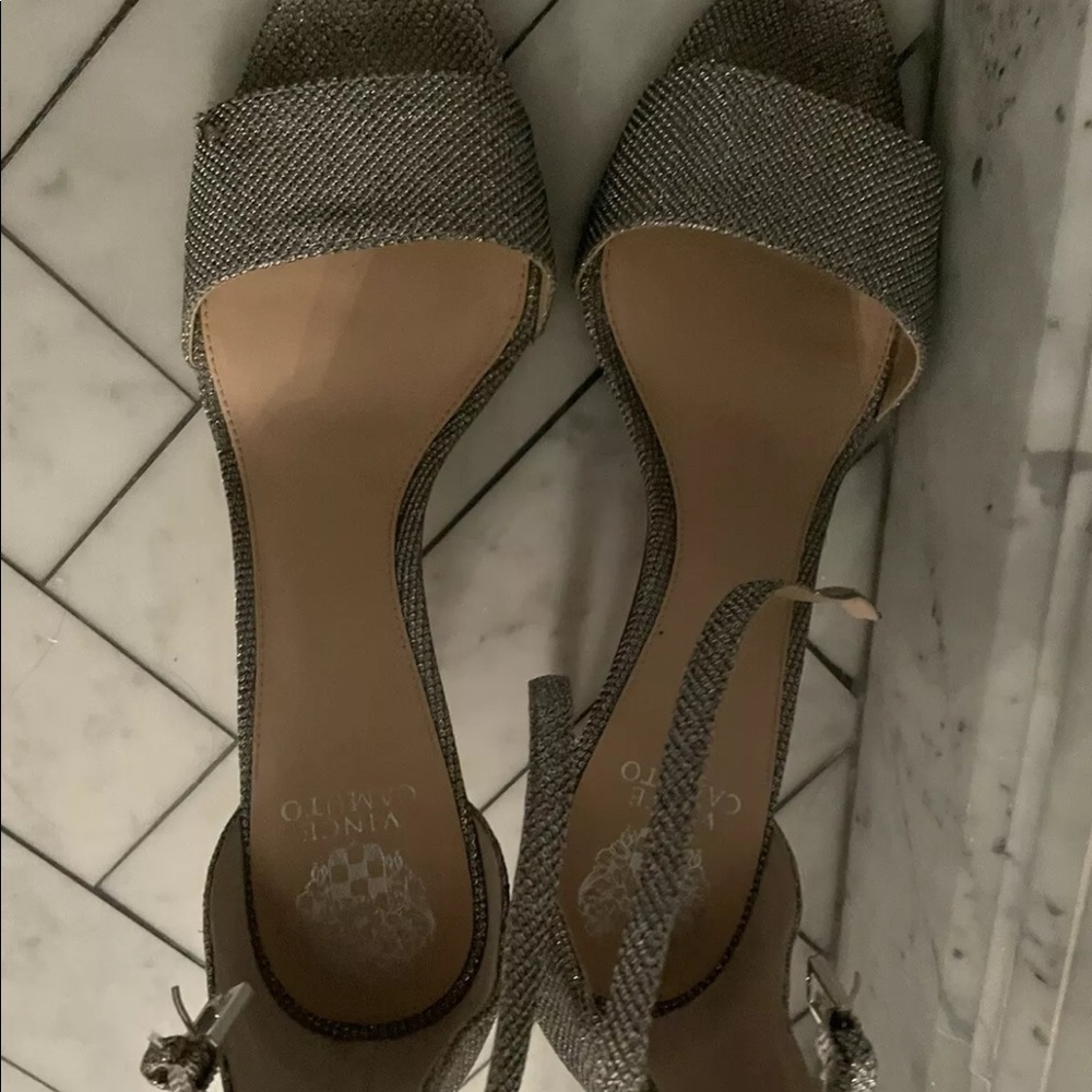 Vince camuto silver strappy heels size 12 some signs wear by heel.
